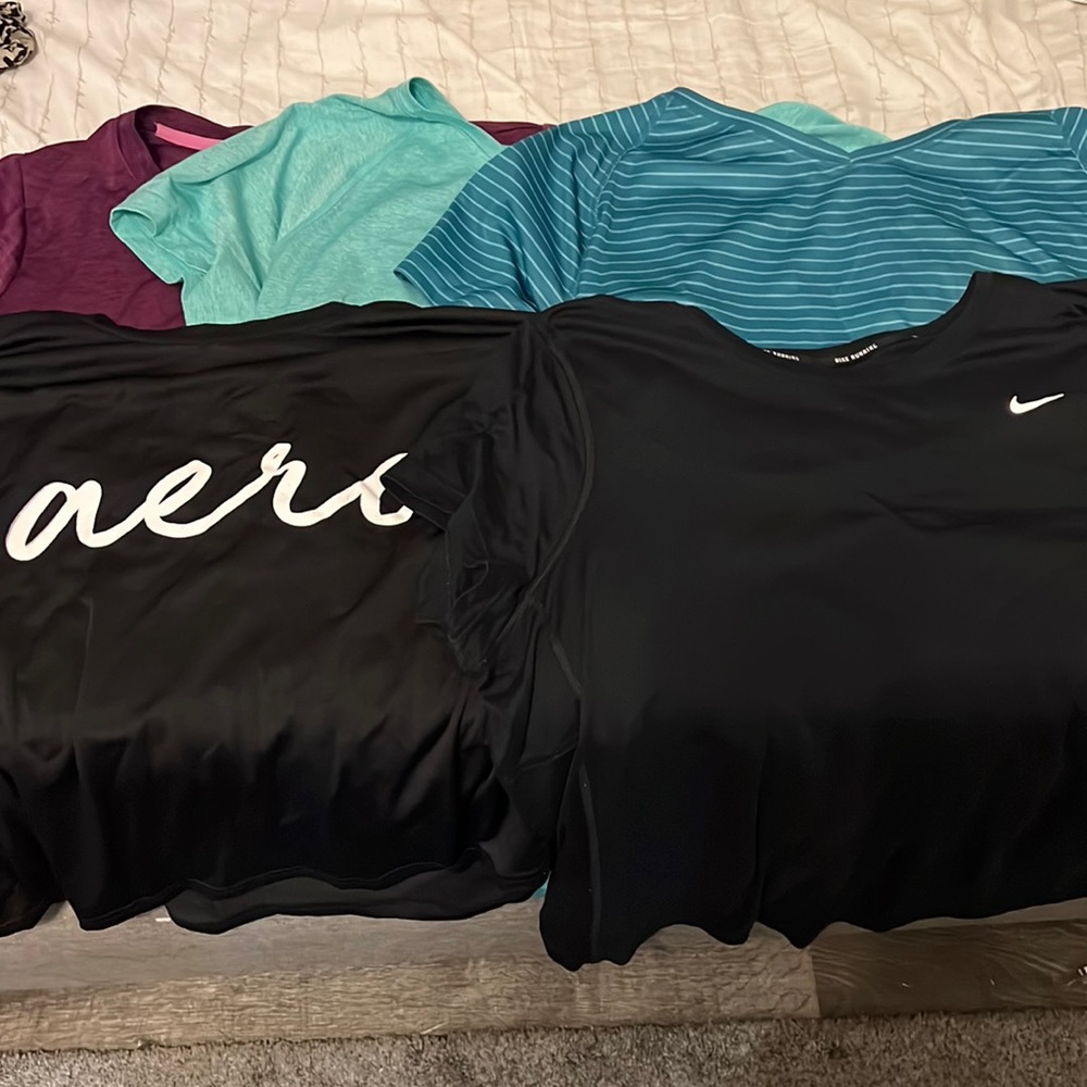 Package of workout shirts INCLUDING ONE NIKE AND AERO!